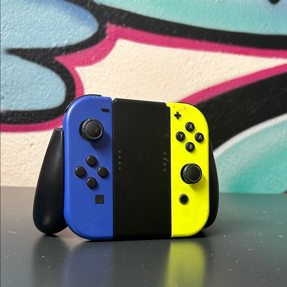 Nintendo Joy-Con Controllers - Blue and Yellow - Picture 1 of 6